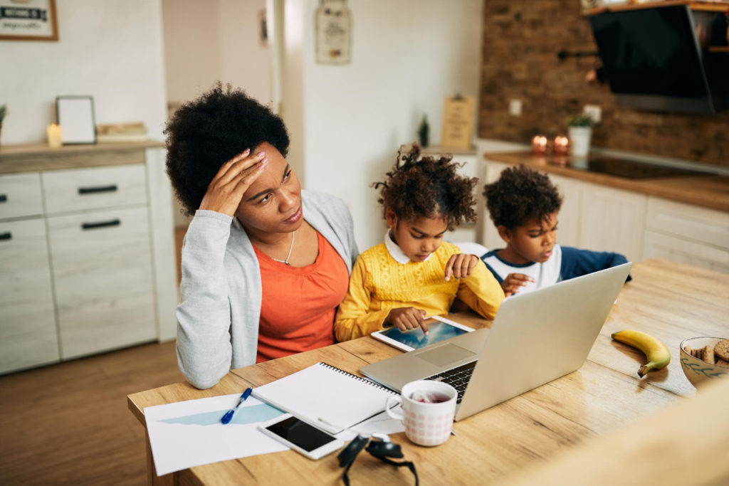 single mother feeling stressed out while working